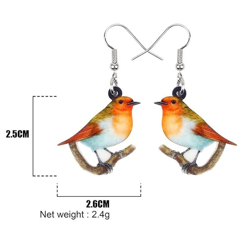 A pair of blue titmouse design pendant earrings made from printed acrylic on a geometric shape.