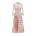 Women's black long sleeve dress with beaded embroidery and a mid waist design.