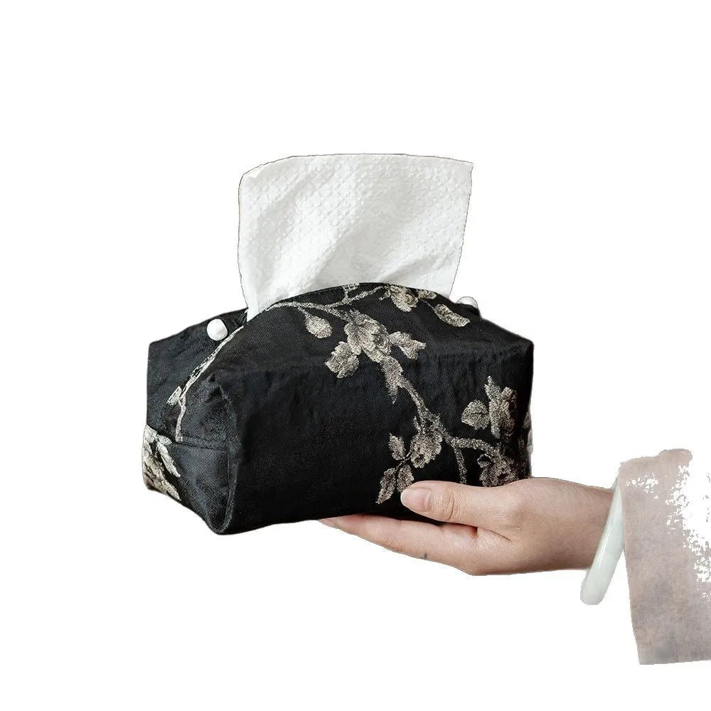 White Chinese brocade tissue box cover with embroidered plum design and optional pearl buckle.