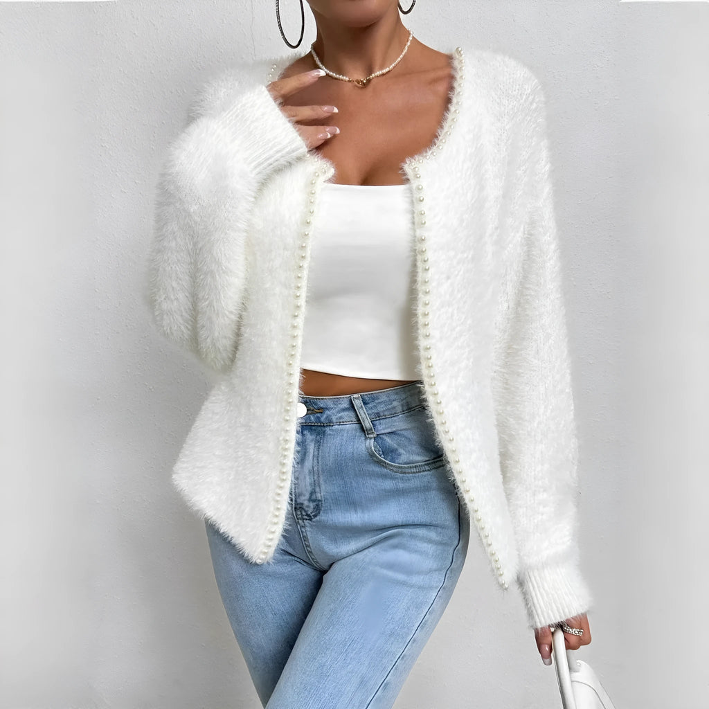 Women's white V-neck cardigan sweater with medium thickness polyester construction