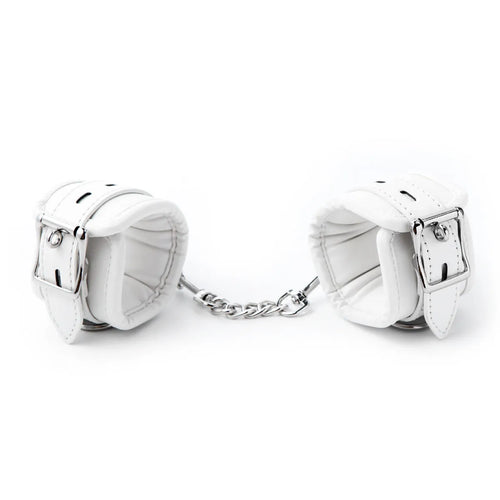 White PU sponge bondage restraint set showing handcuffs, footcuffs and neck cuff accessories