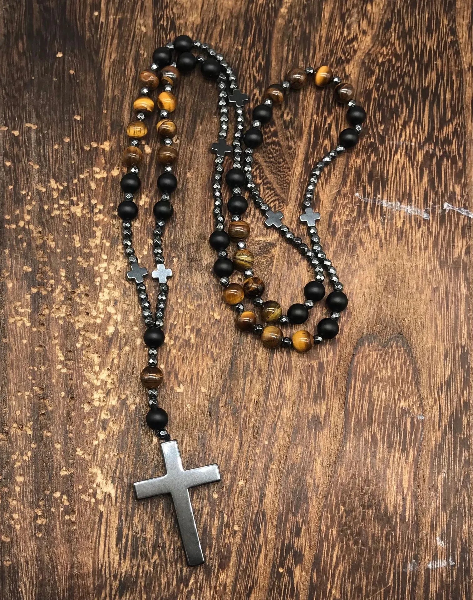 Men's stone geometric cross pendant on an 80cm ball bead chain with safety lock.