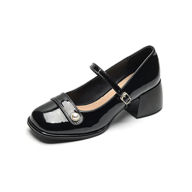 Women's apricot patent leather heel pumps with a chunky block heel and buckle fastening