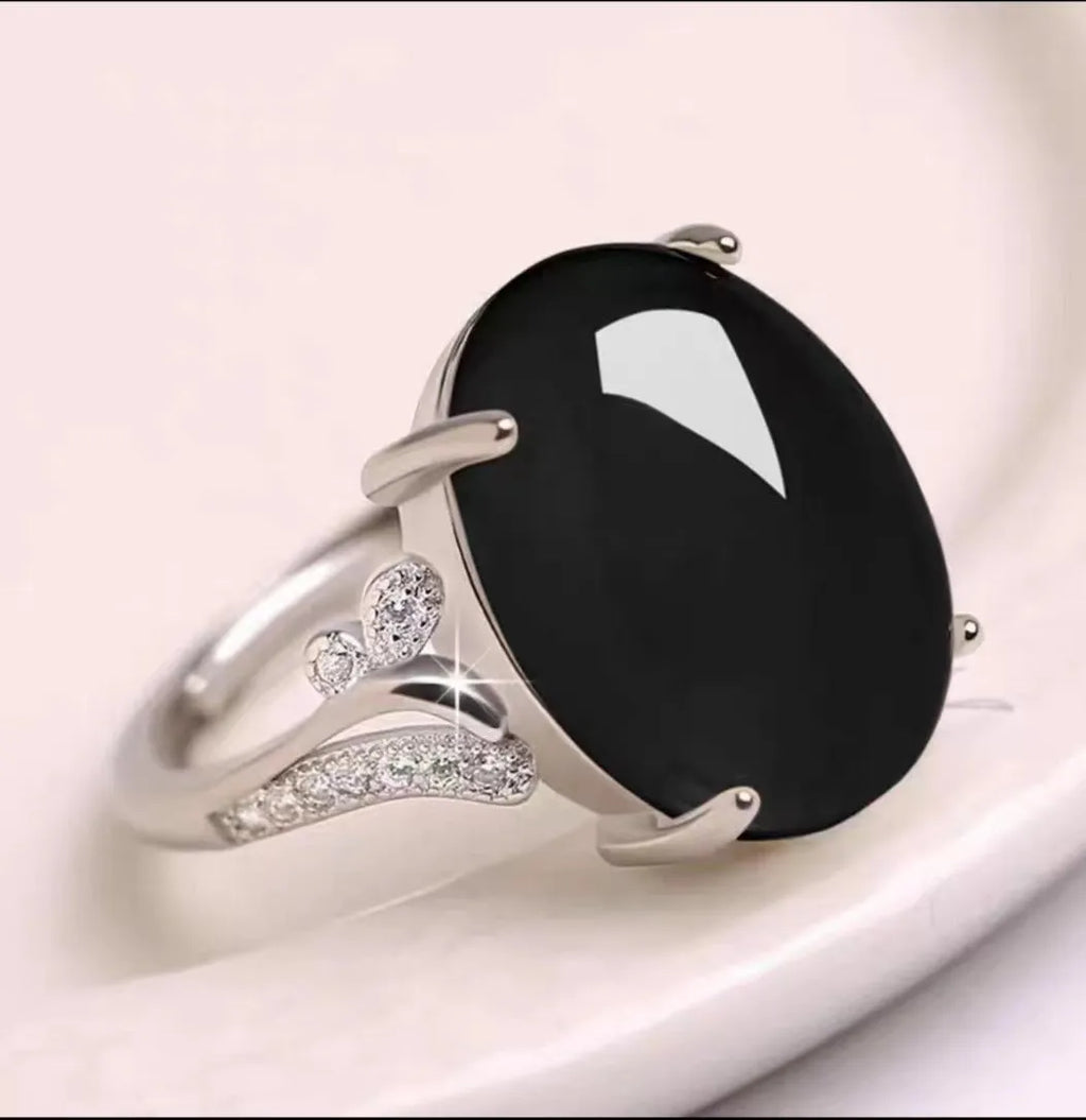 Geometric ethnic-style adjustable ring with a natural sapphire stone in one of five colours.
