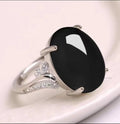 Geometric ethnic-style adjustable ring with a natural sapphire stone in one of five colours.