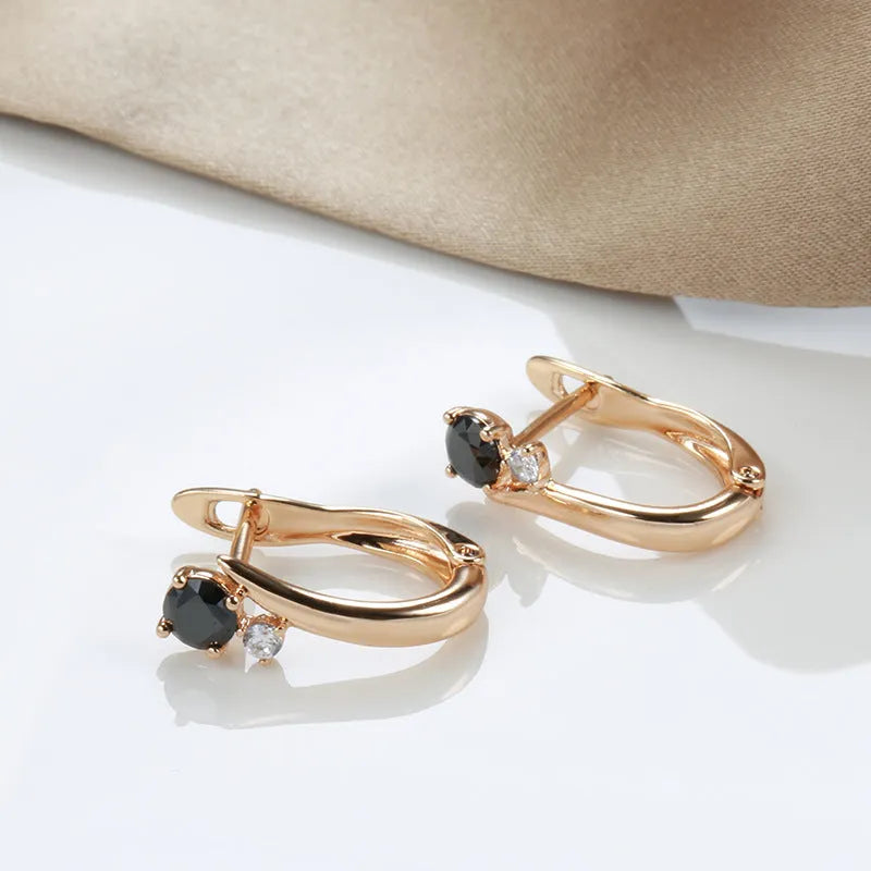 Gold retro geometric drop earrings for women with a gemstone inlay.