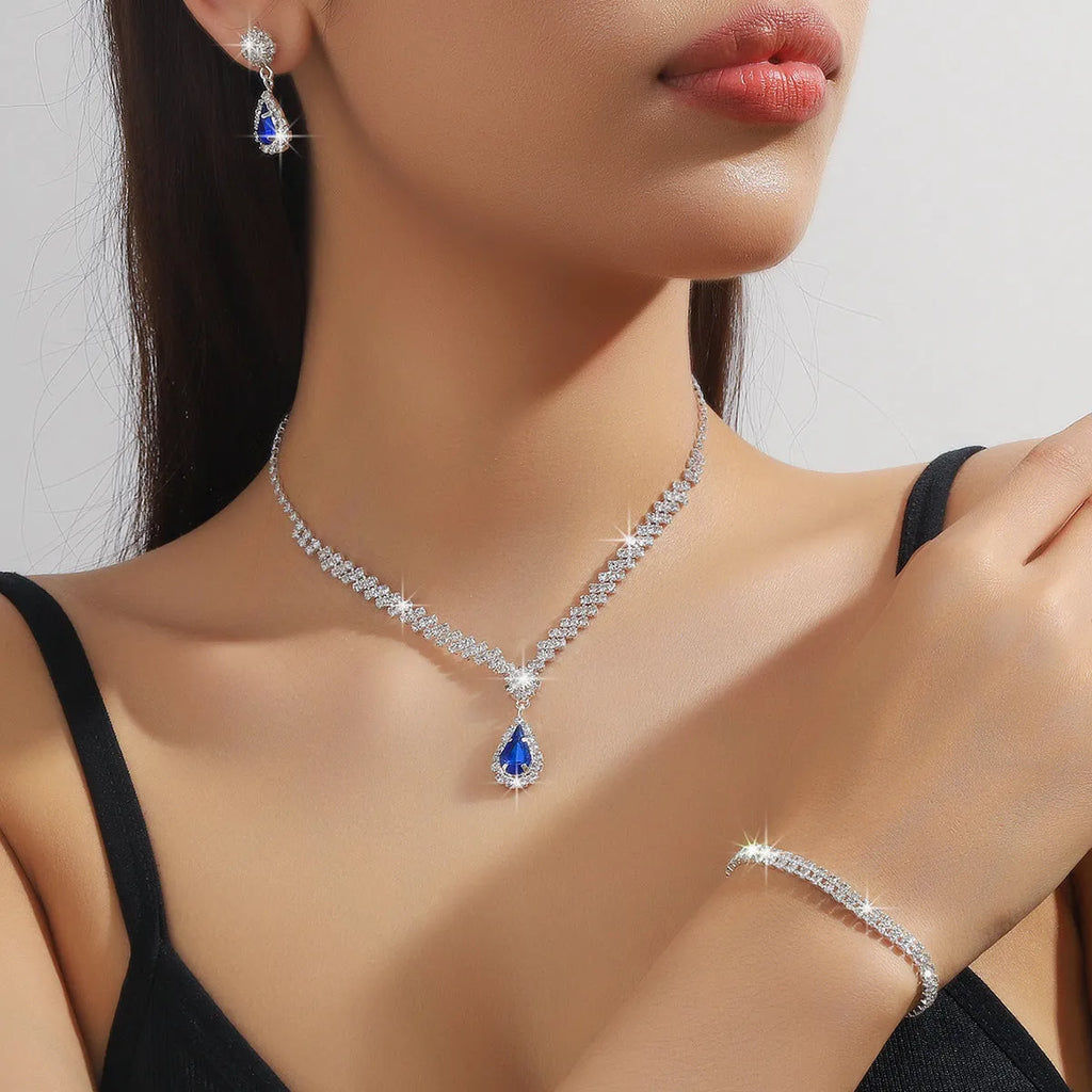 Claw chain rhinestone necklace and earrings set with water drop shape in blue colour