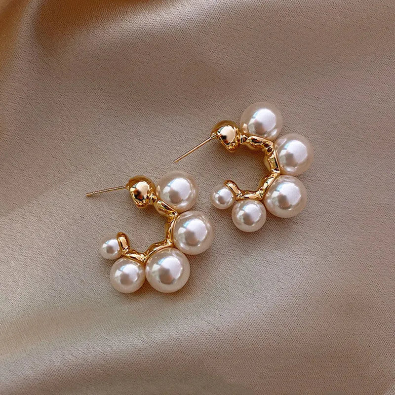 Round alloy bell drop earrings in red colour for pierced ears