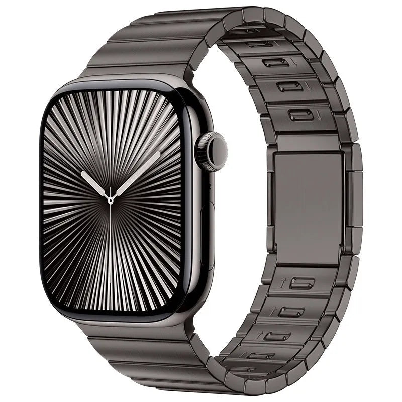 Stainless steel Apple Watch strap with magnetic buckle in multiple colour options on a wrist.