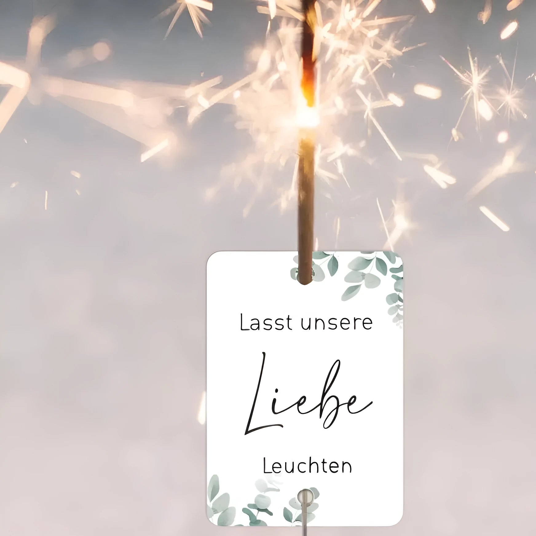 White decorative paper labels with fireworks design and I Make Love sparkling text