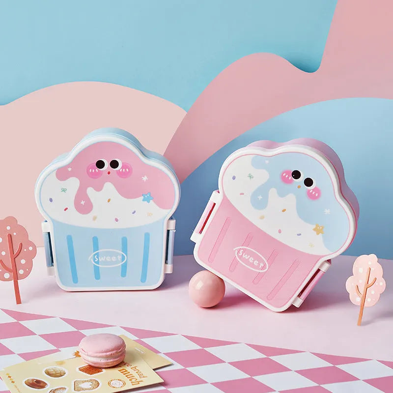 Pink and blue creative ice cream shaped plastic lunch box with spoon and fork set on a white background.