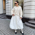 Women's solid colour cotton long skirt in black or white with elastic waistband