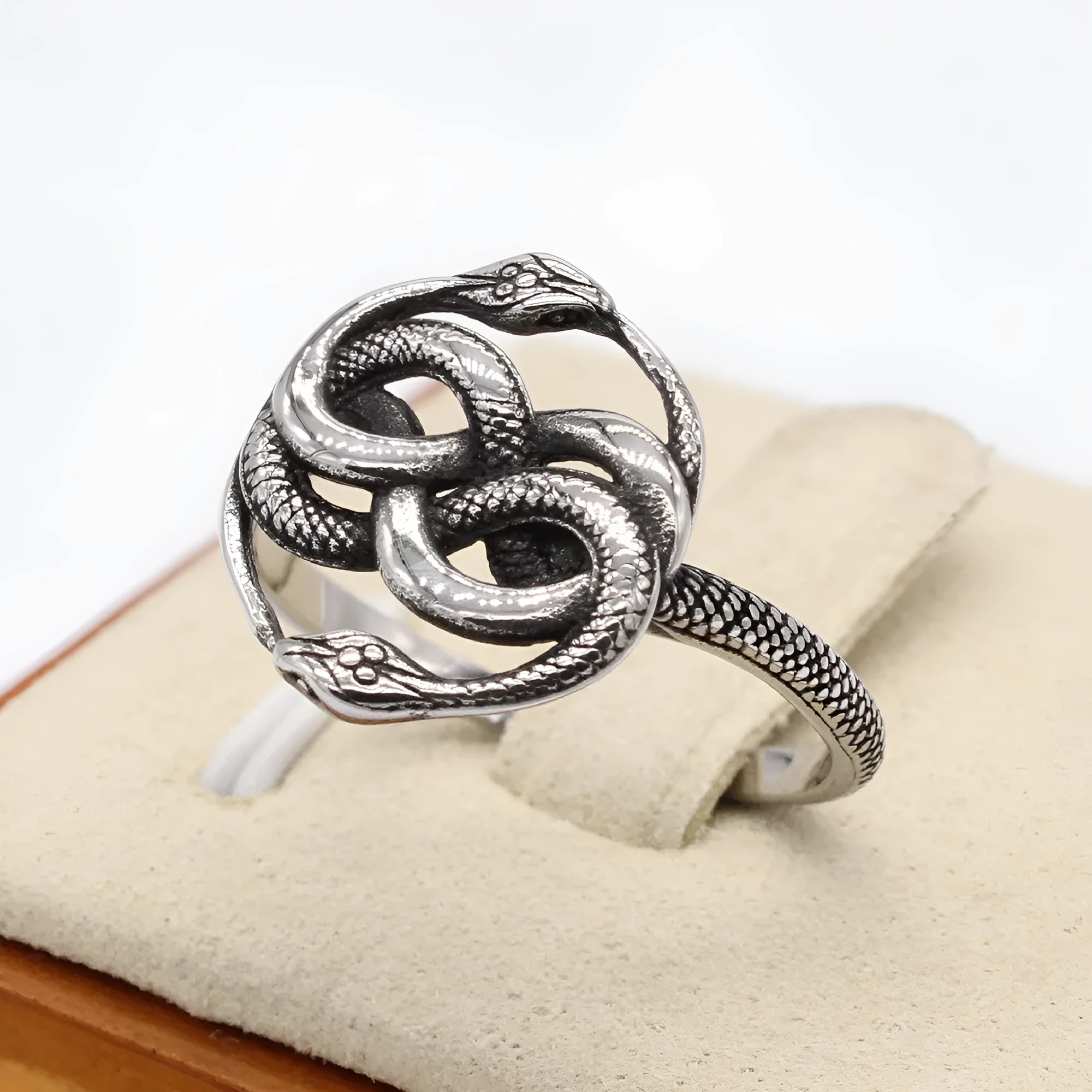 Retro style titanium steel double snake ring in steel colour on size chart