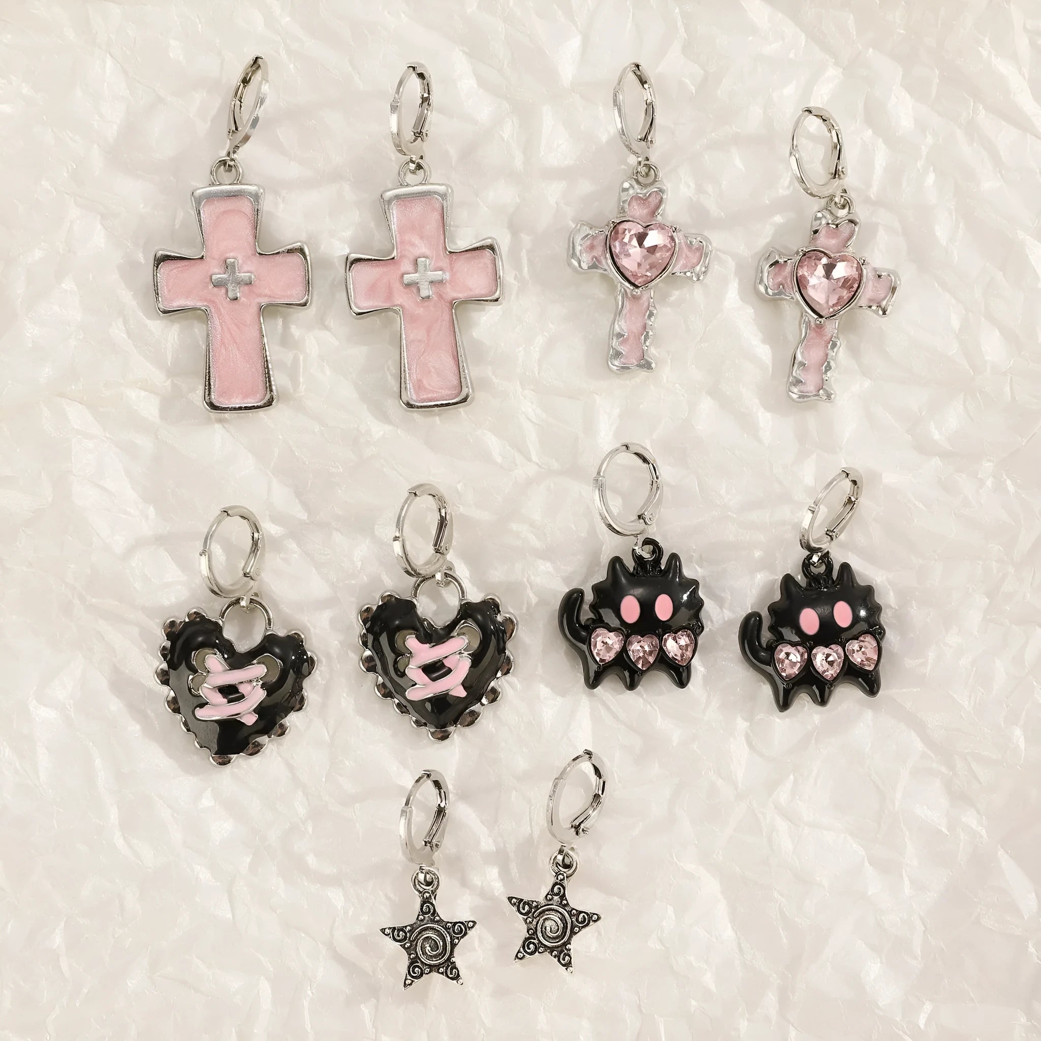 Women's alloy earrings with crystal cross designs in five colour options including white, peach heart, and antique silver