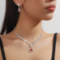 Claw chain rhinestone necklace and earrings set with water drop shape in blue colour