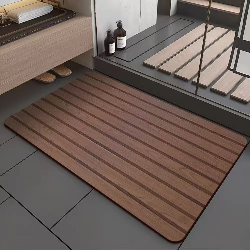 Square diatom ooze floor mat with geometric wood grain pattern in a bathroom setting.