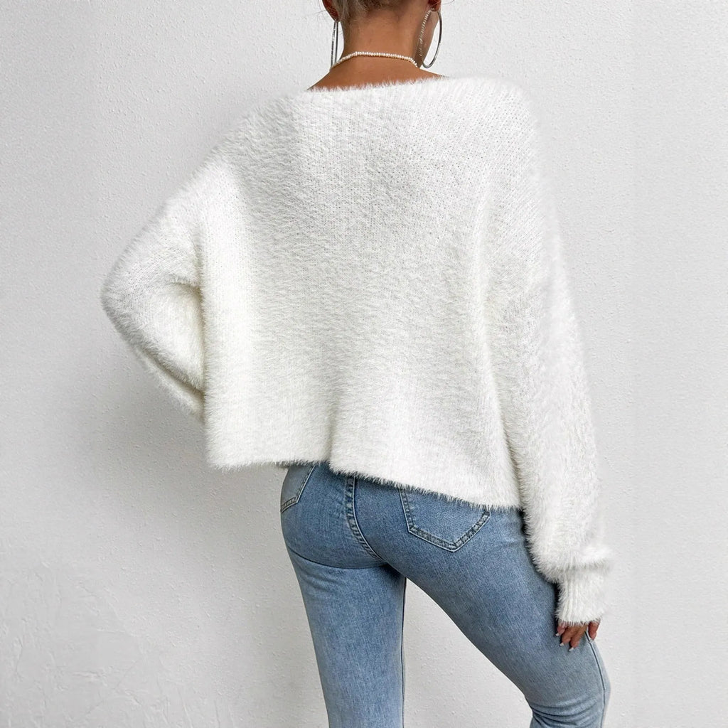 Women's white V-neck cardigan sweater with medium thickness polyester construction
