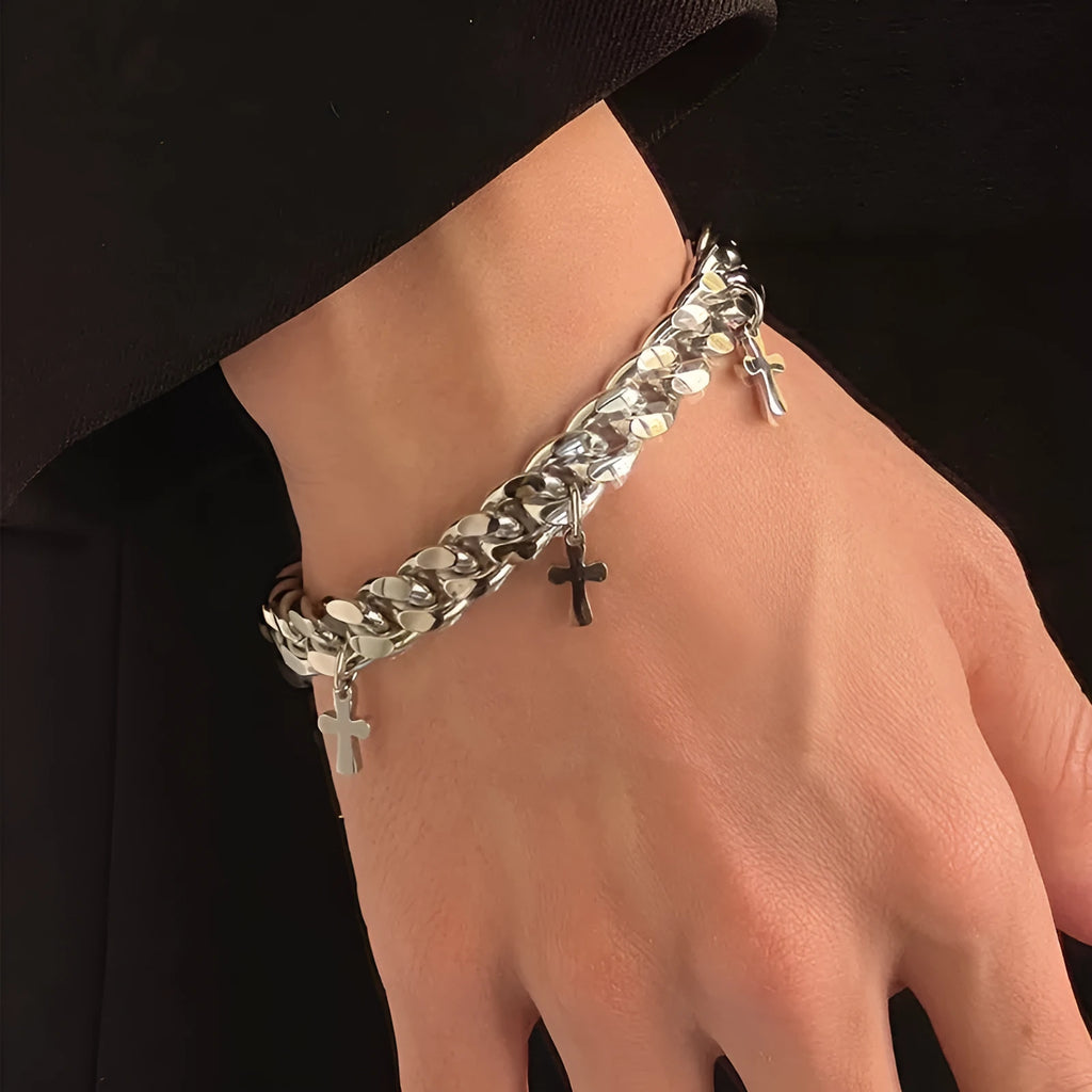 Men's titanium steel geometric bracelet with a cross design on a white background.