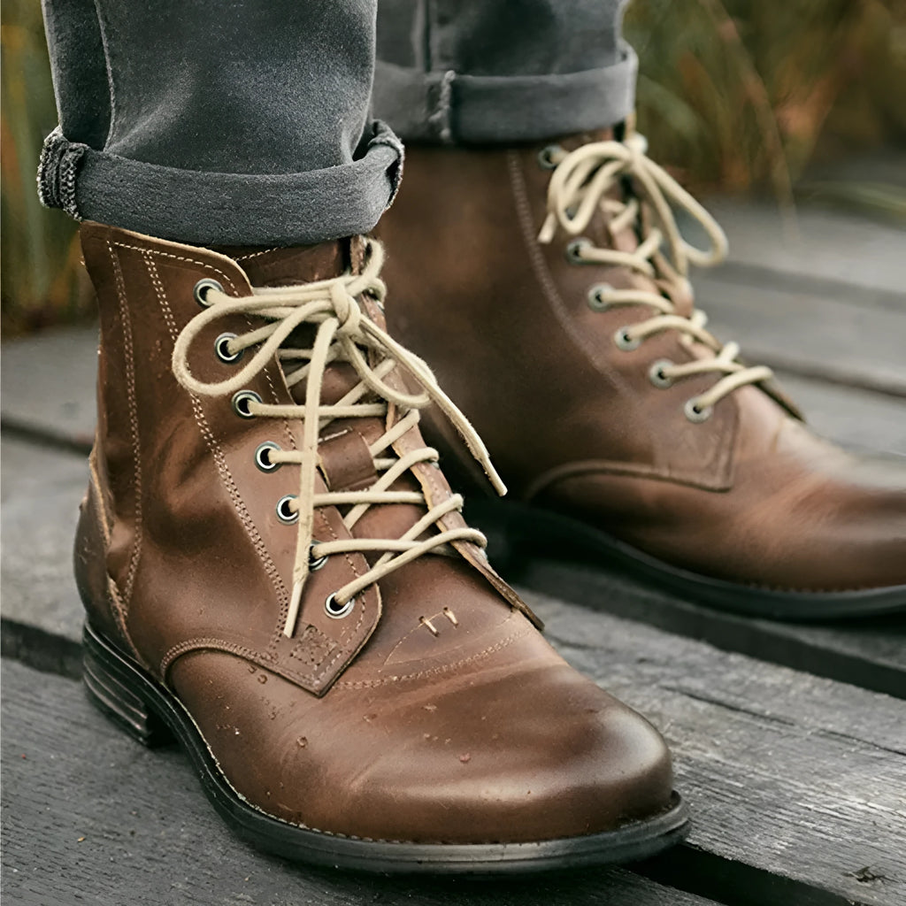 Knight Series two-tone leather boots with side zipper in black colour showing low heel and mature styling