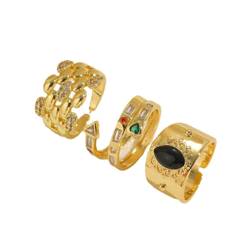 Geometric copper ring with Chinese style design and electroplated finish in horse eye black colour