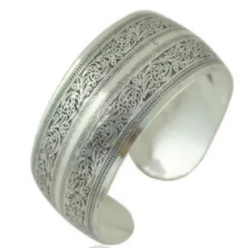 Ethnic carved open Miao silver bracelet in alloy with elephant or turtle colour finish