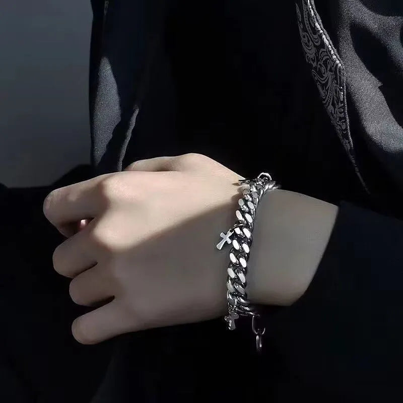 Men's titanium steel geometric bracelet with a cross design on a white background.