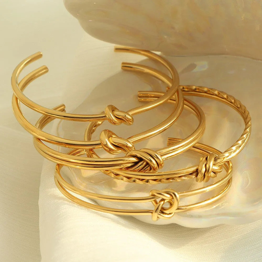 Women's stainless steel bracelet with C-shaped open design and knotted double-layer construction