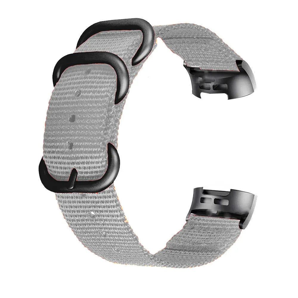 Nylon three-ring buckle replacement strap for Fitbit Charge 3 fitness tracker in multiple colours.