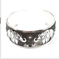 Ethnic carved open Miao silver bracelet in alloy with elephant or turtle colour finish