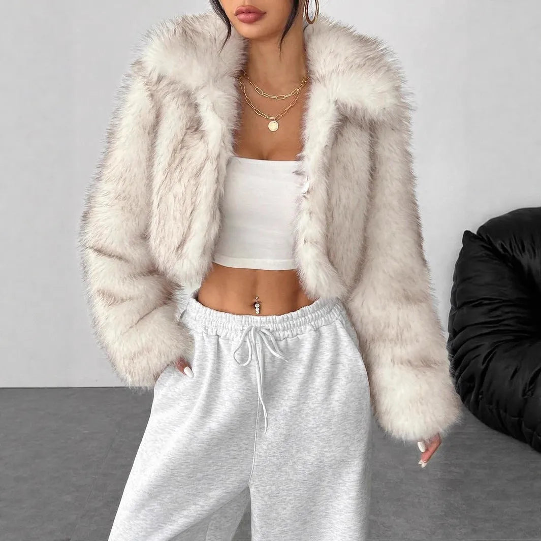 Women's faux fur coat with fur collar in black tip on black background colour