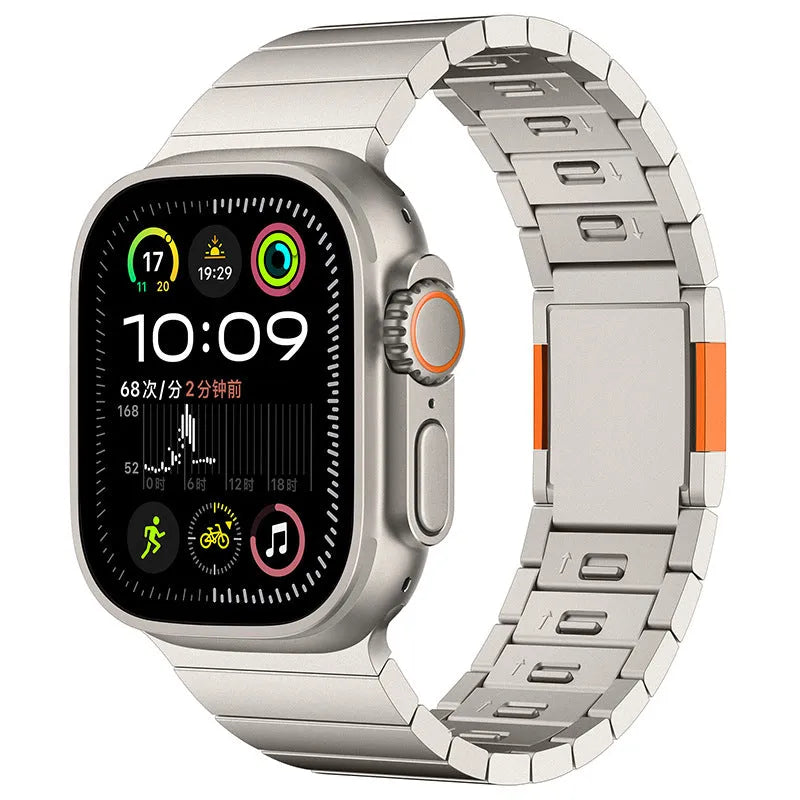 Stainless steel Apple Watch strap with magnetic buckle in multiple colour options on a wrist.