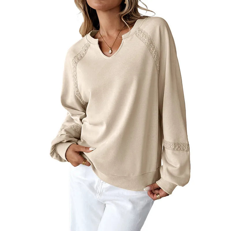 Women's loose fit long sleeve sweater with half-open collar and lace trim in solid colour