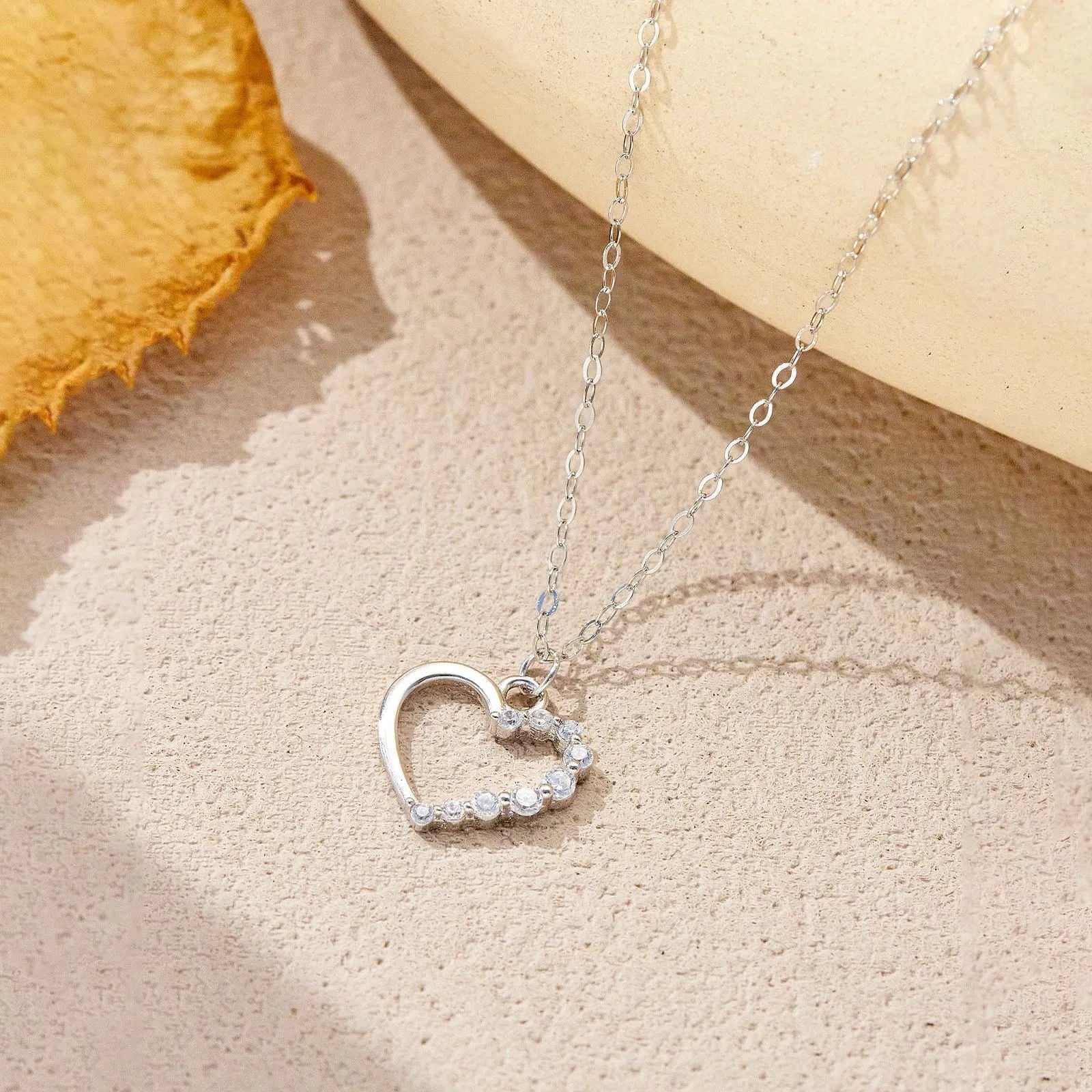 S925 sterling silver hollow heart necklace with circle detailing on regular chain