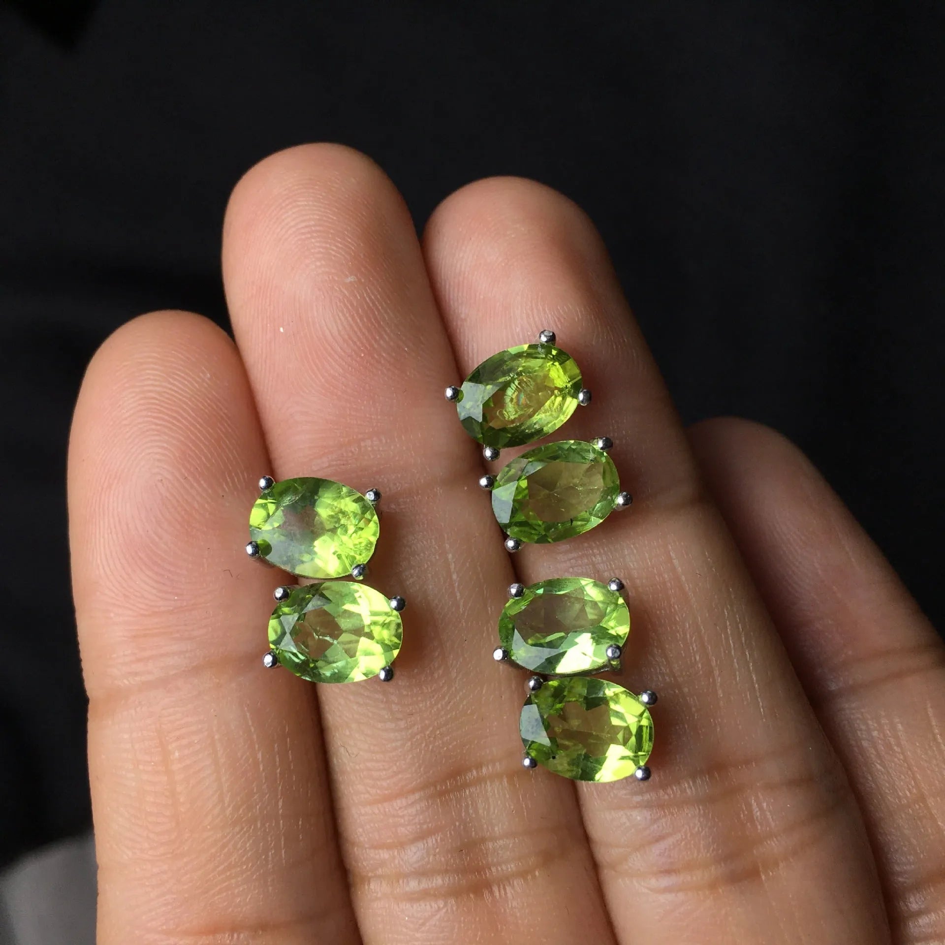 Grass green natural Olivine faceted stud earrings in S925 sterling silver settings.