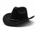 Brown leather velvet western cowboy hat with a curved brim and conical crown on a neutral background.