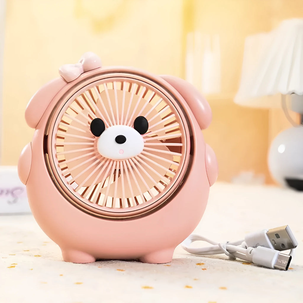 Cute dog-themed USB desktop electric fan on a desk, showing brown puppy colour variant.