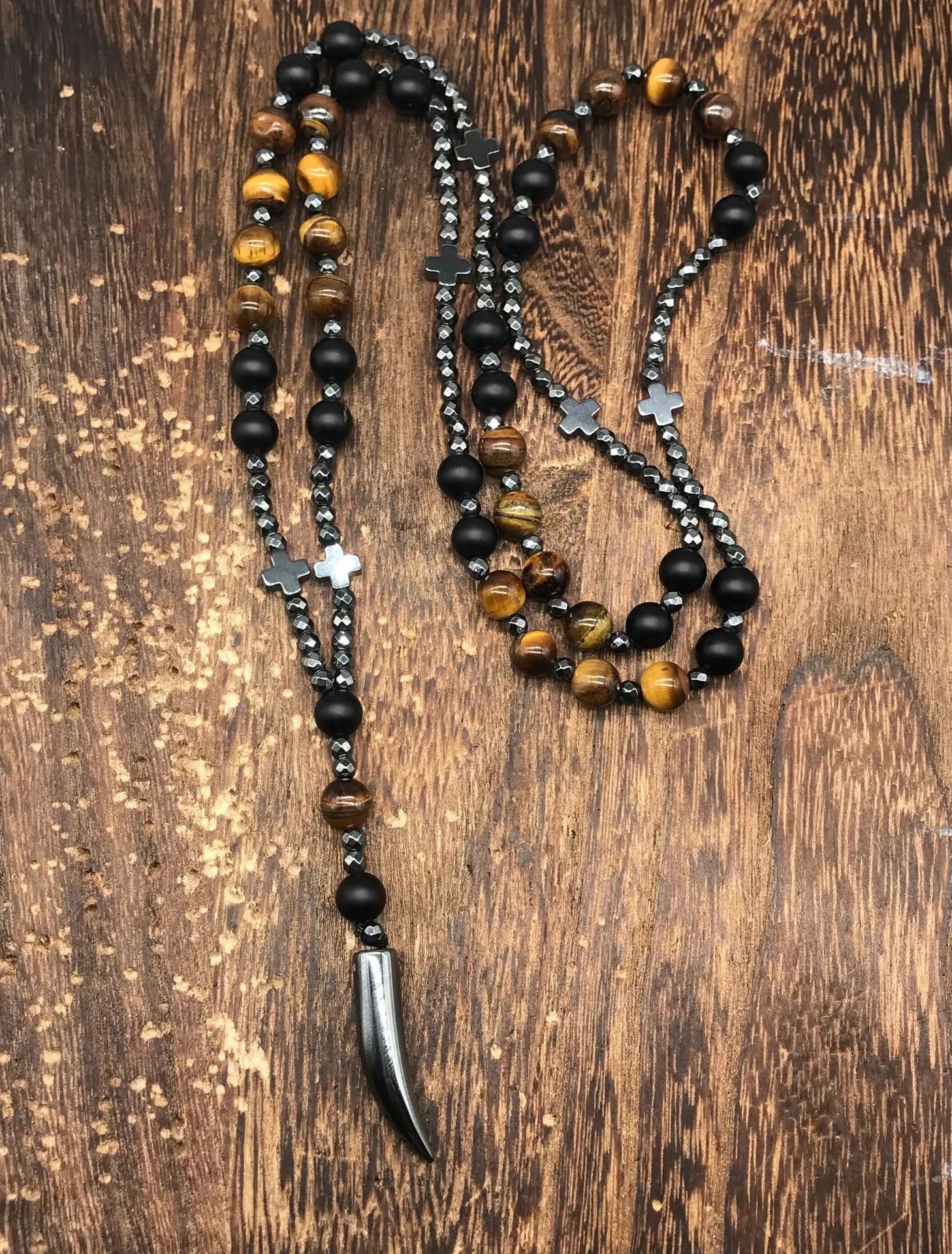 Men's stone geometric cross pendant on an 80cm ball bead chain with safety lock.