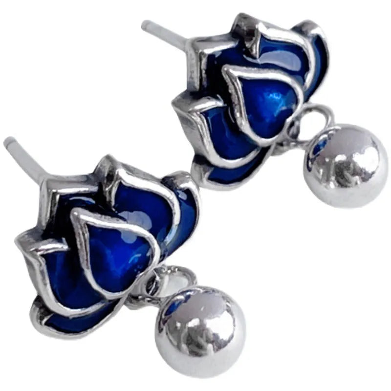 Blue Lotus alloy stud earrings with detailed lotus seedpod tassel and flower design