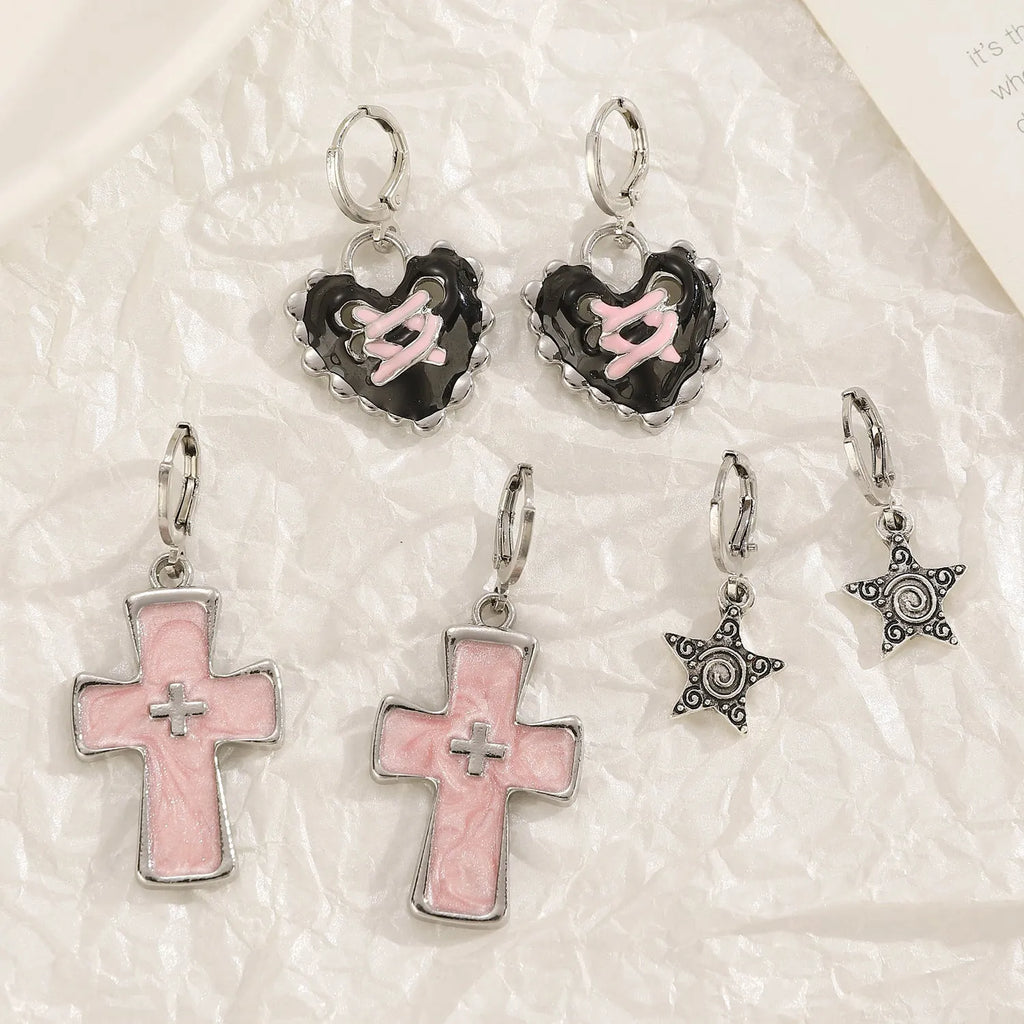 Women's alloy earrings with crystal cross designs in five colour options including white, peach heart, and antique silver