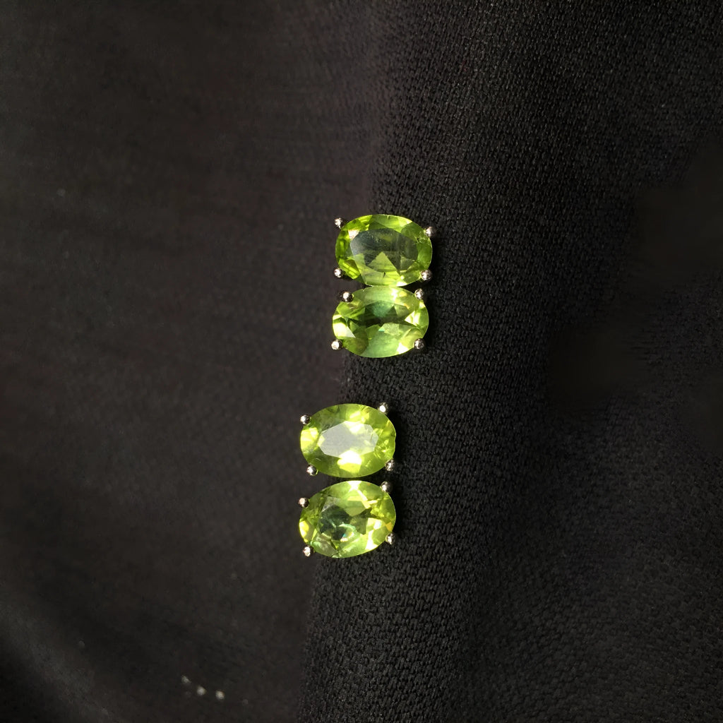 Grass green natural Olivine faceted stud earrings in S925 sterling silver settings.