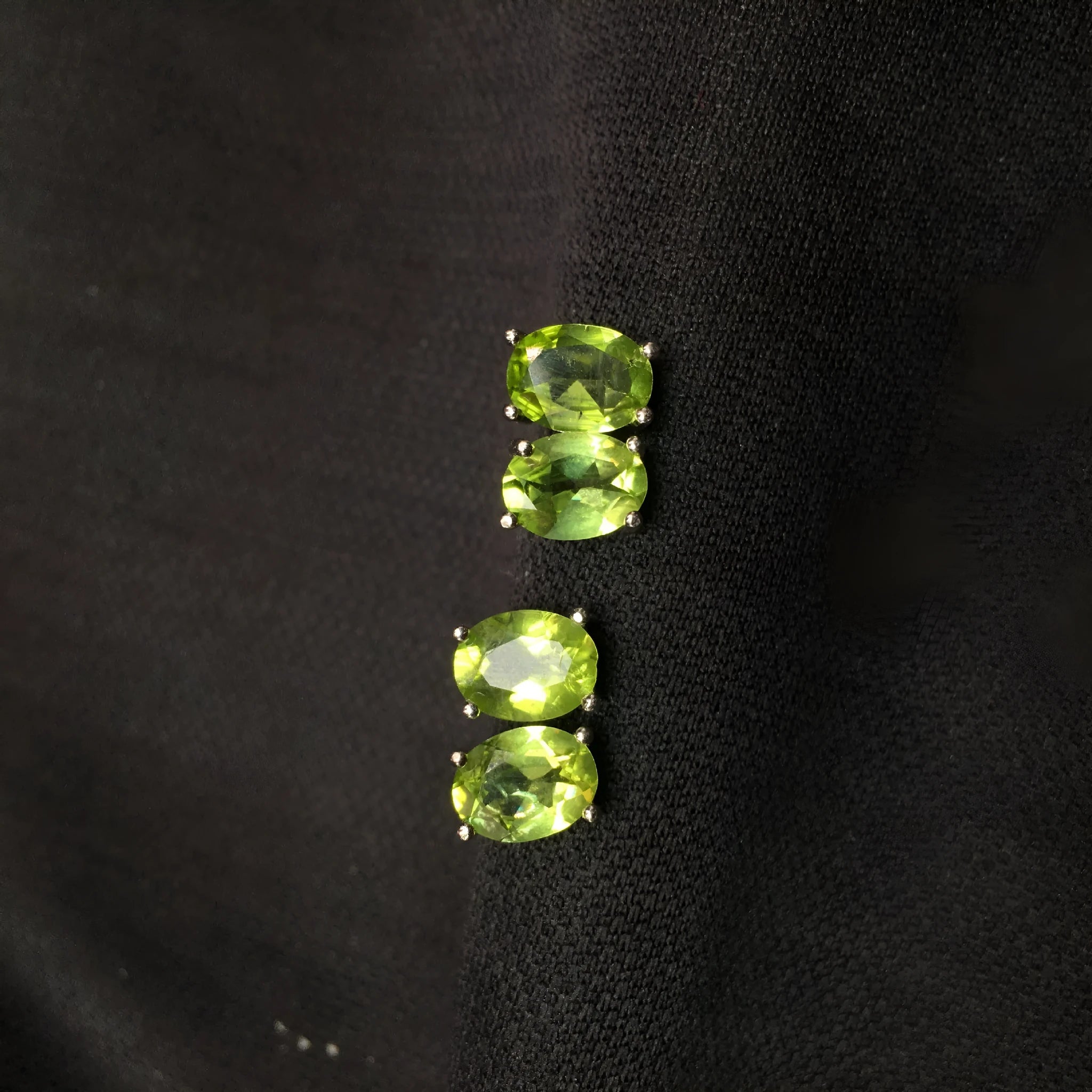Grass green natural Olivine faceted stud earrings in S925 sterling silver settings.