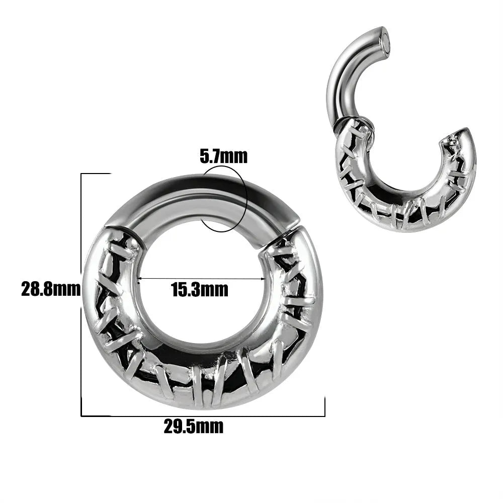 A pair of silver totem pattern stainless steel fashion earrings on a white background.