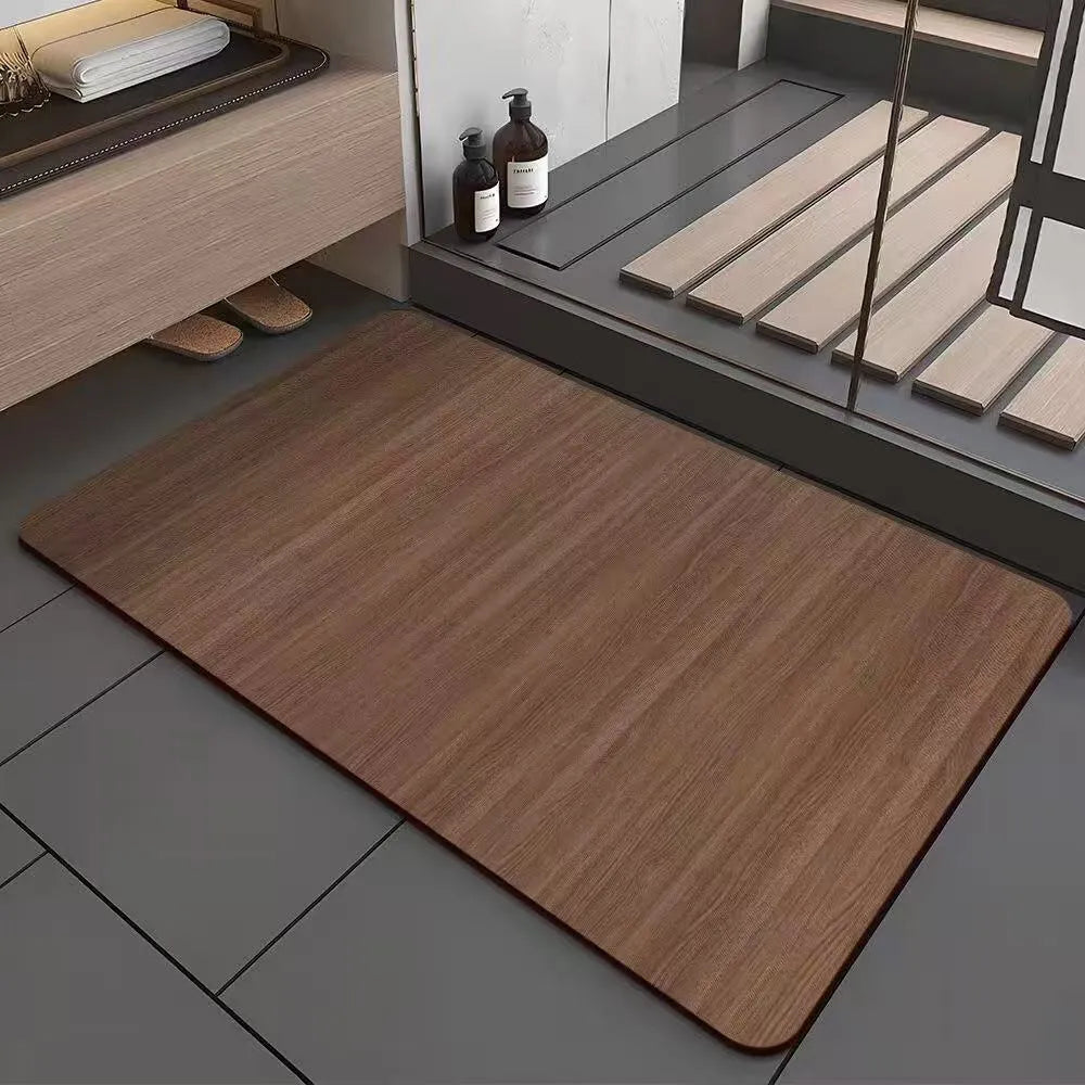 Square diatom ooze floor mat with geometric wood grain pattern in a bathroom setting.