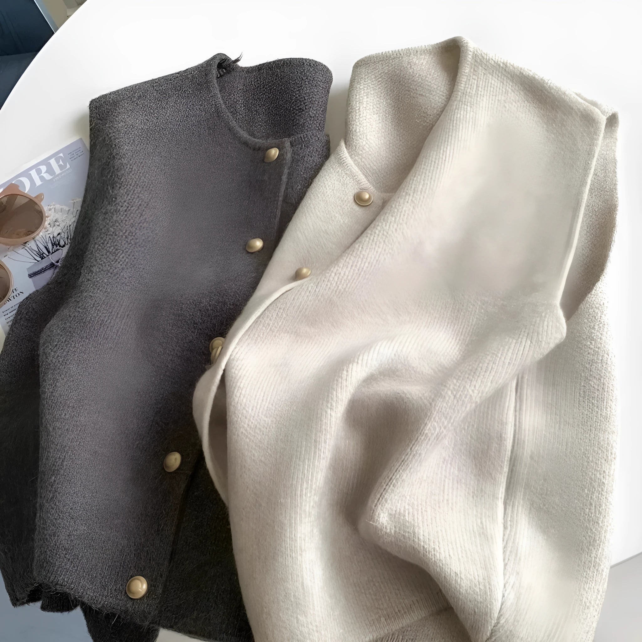 Women's polyester pullover vest with half sleeves in smoky grey, available in medium and large sizes by weight
