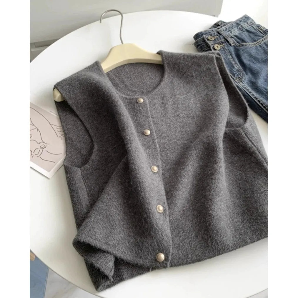 Women's polyester pullover vest with half sleeves in smoky grey, available in medium and large sizes by weight