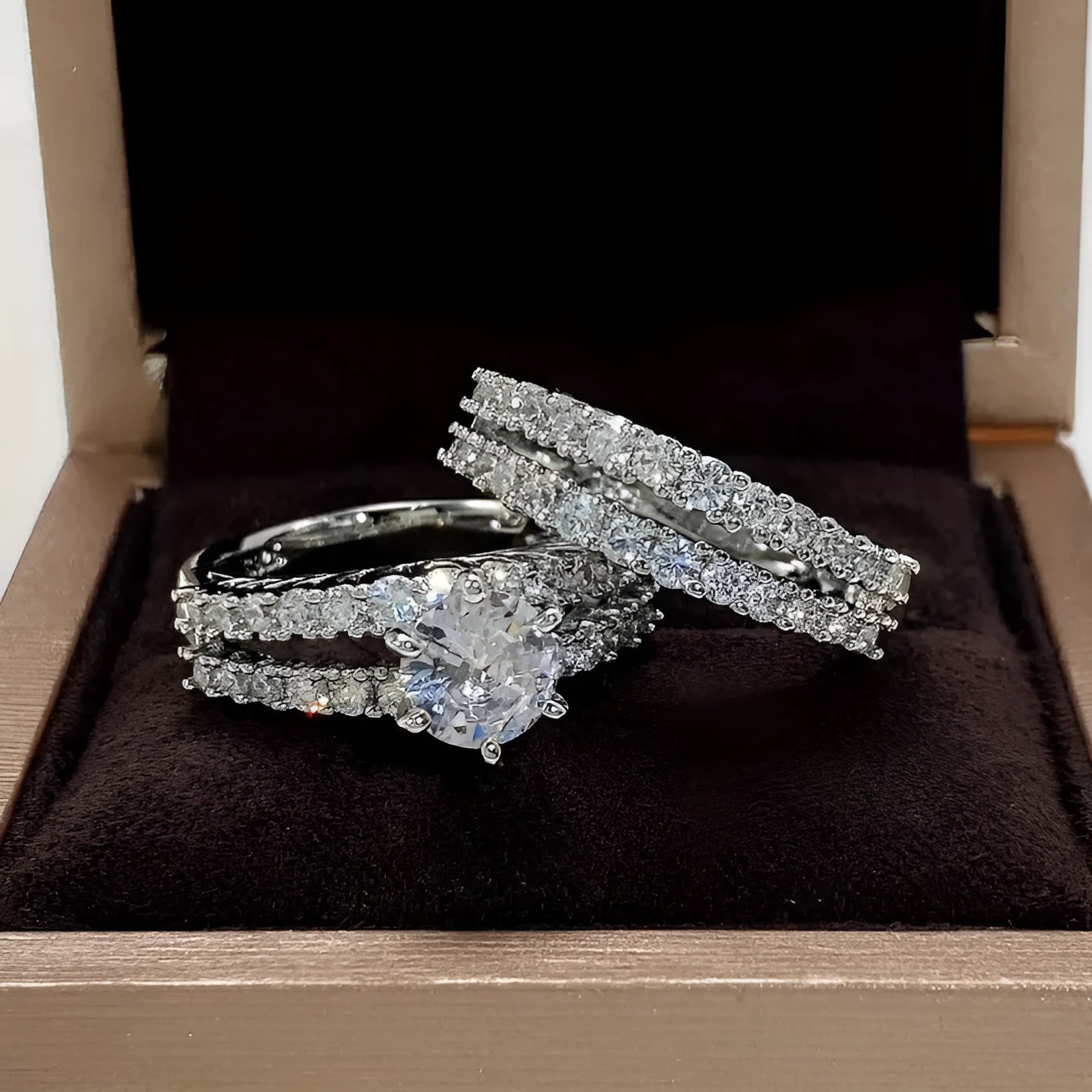 2 in 1 women's ring set showing fashion and fully jewelled geometric bands in silver, gold and rose gold colours
