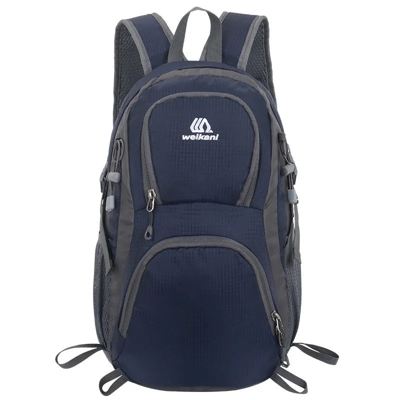 Black outdoor backpack with air pillow belt, shown with other colour options: blue, dark blue, lake blue, orange, and purple.