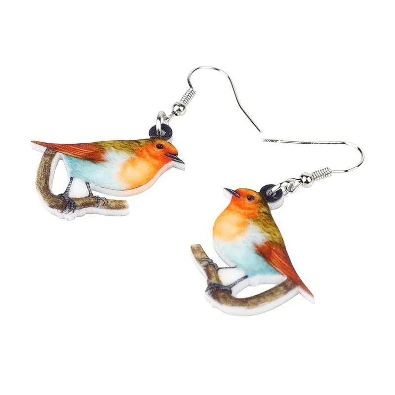 A pair of blue titmouse design pendant earrings made from printed acrylic on a geometric shape.