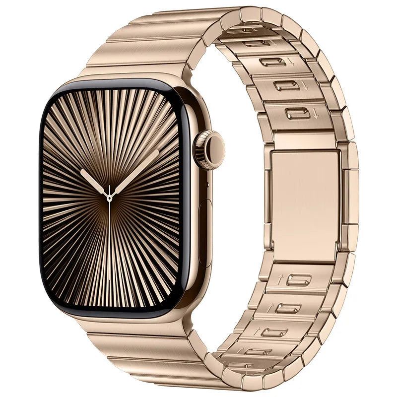 Stainless steel Apple Watch strap with magnetic buckle in multiple colour options on a wrist.