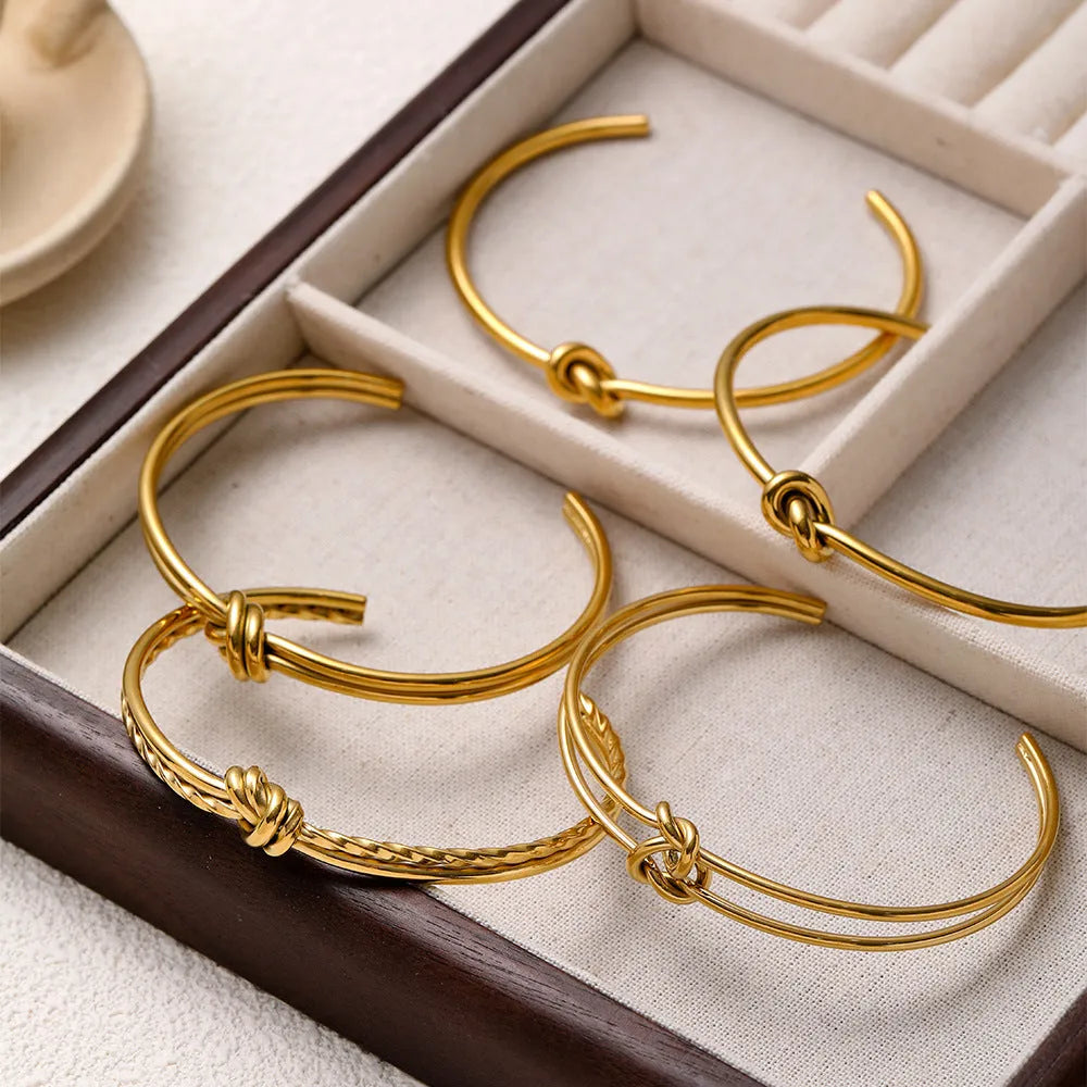 Women's stainless steel bracelet with C-shaped open design and knotted double-layer construction